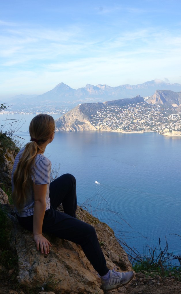 Emily looks out over the Mediterranean Sea in Calpe, Spain.