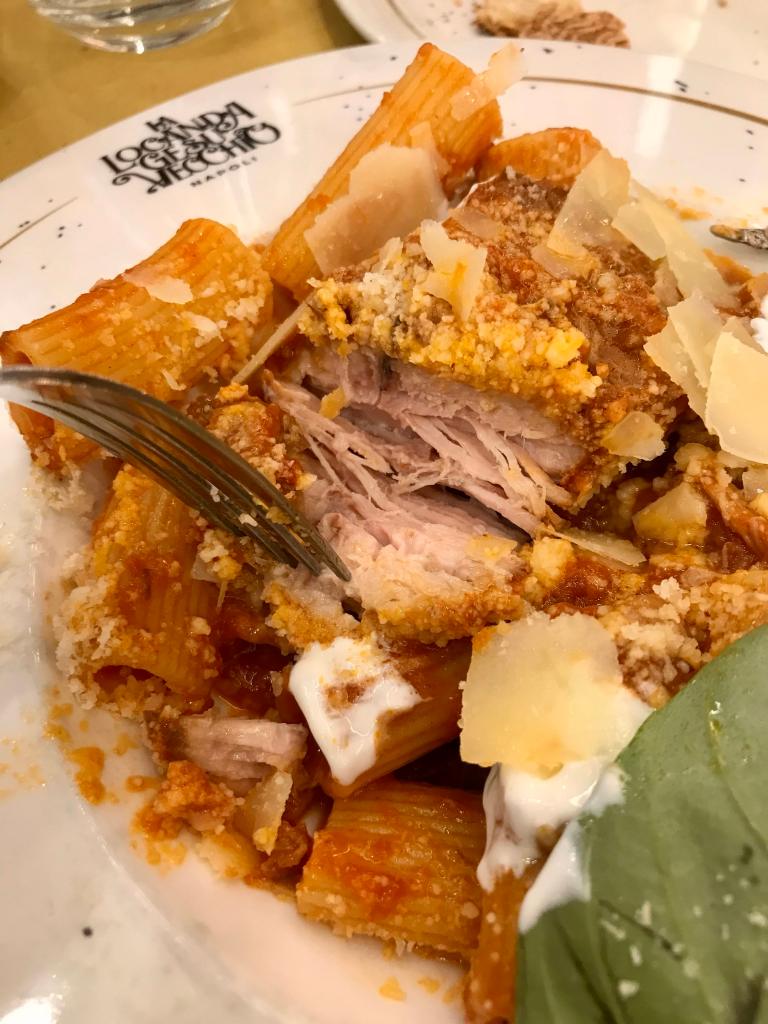 Rigatoni al Ragù con Ricotta from La Locanda Gesù Vecchio in Naples, Italy. This dish has a red meat sauce with both pork and beef, two types of cheese, and rigatoni pasta.